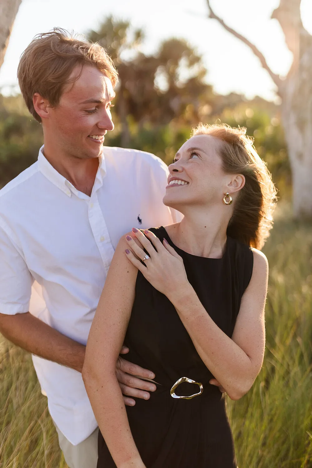 Close sunlit couples portrait