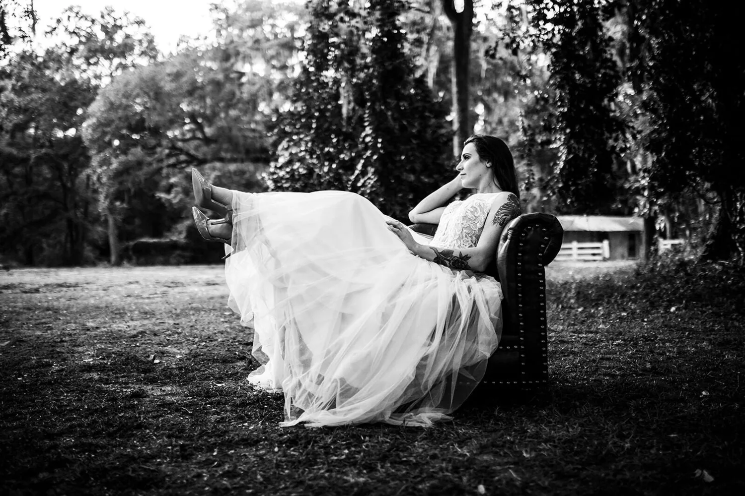 Black and white bridal editorial portrait on a couch
